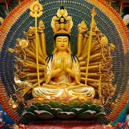 <lora:Guanyin2:1>,Compassionate face of Thousand-Armed Thousand-Eyed Guanyin,multiple serene expressions,forty additional faces each with an eye,innumerable compassionate hands holding various ritual implements such as precious vase,treasure sword,lotus,prayer beads symbolizing different meanings like disaster relief,subdual,and prayer,specific hand gestures signifying fearlessness and fulfilling wishes,ornate crown with a representation of transforming Buddha denoting bodhicitta and Buddha-nature,draped in divine garments with a waist-tied long skirt adorned with jewellery and pearls signifying dignity and divinity,elaborate radiant halo in the background circular or polygonal with symmetrical arms each wielding implements reflecting the brightness of Guanyin,surrounded by devoted followers and Dharma protectors like Heavenly Kings,deities,and Vajra displaying protective force,standing or sitting in full lotus position on a lotus pedestal symbolizing purity and detachment,all detailed with ((best quality,4k,8k,highres,masterpiece:1.2),ultra-detailed,(realistic,photorealistic,photo-realistic:1.37)) in a wondrous and sacred atmosphere that is tranquil yet powerful,enhanced with luxurious golds,tranquil blues and pure whites,studio lighting to highlight the transcendent aura of the deity,