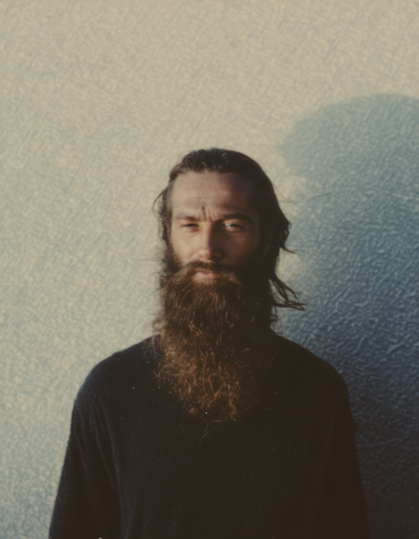 polaroid film photography, faded film, soft focus, man with long beard, 4k, uhd, masterpiece