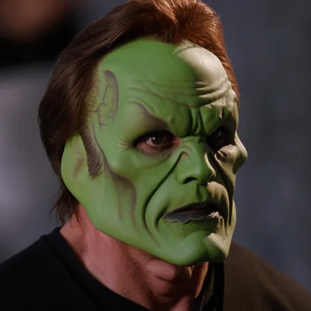 detailed high quality photo of a man with a (((green head))) and brown hair, the_mask,  <lora:BigHeadMask_V1_Dorian_SDXL:0.7>