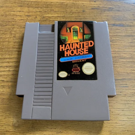 nes videogame cartridge, Haunted House, english text, no humans, solo, parody <lora:nes:1>