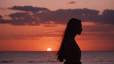 cinematic film still of <lora:silhouette style:1>
A silhouette photo of a woman standing in front of a red sunset,1girl,solo,long hair,black hair,upper body,outdoors,sky,cloud,blurry,shadow,ocean,sunset,horizon,silhouette,orange sky,red sky different shadow patterns, different shadows, cinematic, filmic, different colors, creative cinematography, covered in shadow, perfect shadow, detailed shadow, detailed background, detailed environment, award winning cinematography, casting shadow, film contrast, film saturation, high quality, 8k, silhouette style, shallow depth of field, vignette, highly detailed, high budget, bokeh, cinemascope, moody, epic, gorgeous, film grain, grainy