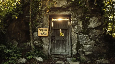 A weathered wooden door stands sentinel amidst the crumbling remains of a once-sturdy stone house, overgrown with vines and moss in the depths of Maine's woods. Golden sunlight filters through the dense foliage above, casting dappled shadows on the ancient stones. A worn wooden sign hangs crookedly from the doorframe, its faded text reading: 'Need Buzz for Feature'.