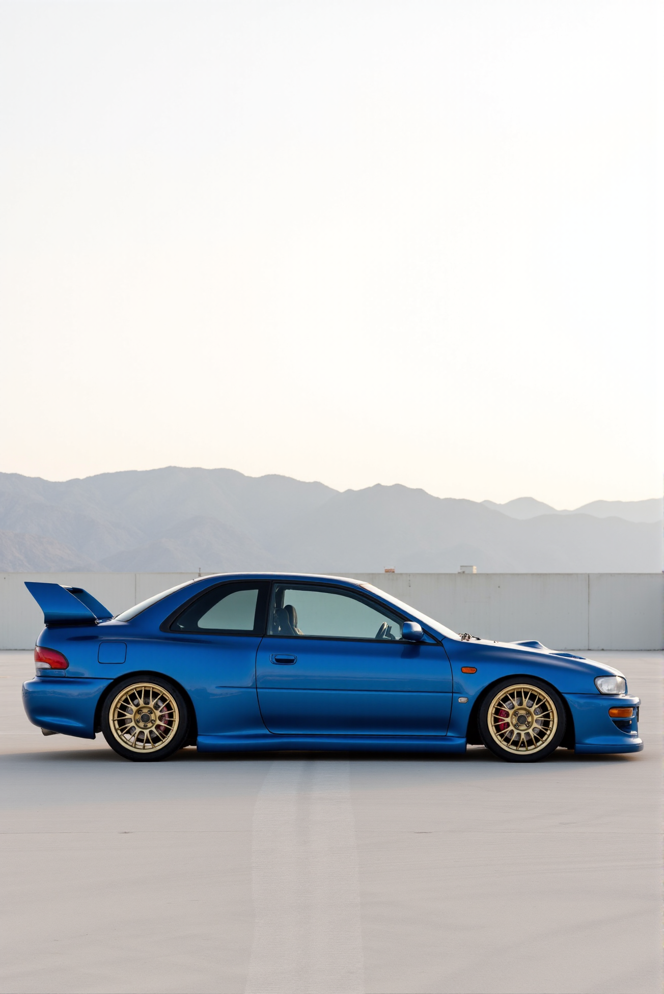 <lora:Subaru_Impreza_WRX_STI_22b:0.8> 
A side profile of a metallic blue Subaru Impreza 22B replica in bold daylight, parked on pristine concrete against a sweeping backdrop of desert mountains and pale sky. Captured at a flat side-on angle, the car’s pronounced widebody fenders, low ground clearance, gold rally wheels, and clean door silhouette emphasize proportional symmetry and rally-derived design. A subtle STI badge appears near the front bumper. The environment reflects faintly on the glossy paint, while long mountain shadows in the distance add atmospheric depth. The car’s details — vented hood, sculpted mirrors, and arched rear wing — are highlighted in crisp line work, presented in hyperreal shading and gradient-rich color grading with subtle heat shimmer over the horizon for a cinematic outdoor mood.