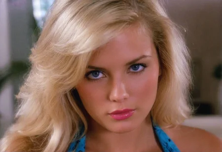 MiamiVice analog photo blonde woman indoors, blue eyes, glossy lipstick, (soft focus, depth of field, film grain, masterpiece, looking at viewer) <lora:MiamiVicev2-XL:0.4> <lora:EuroBabe-v4-XL:0.6>
