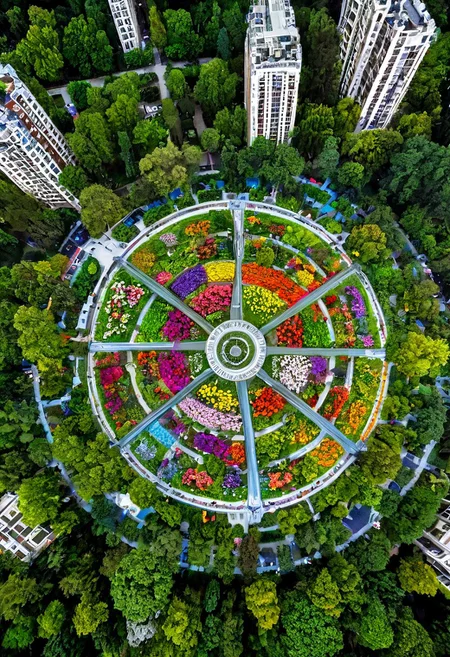 Futuristic City central, green park, tall trees, colorful flowers, realistic, photo realistic, Style-Glorious, scibu, science fiction, building, architecture,