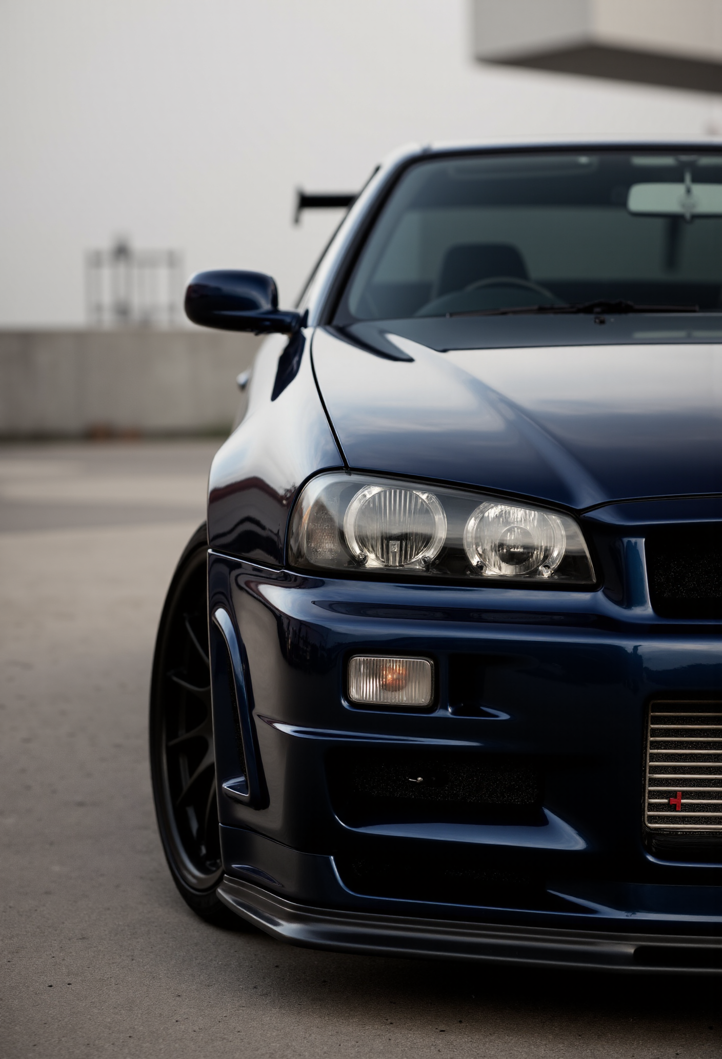 <lora:Nissan_Skyline_GT-R_R34:0.8> A slightly close shot of a modified Nissan Skyline GT-R R34 in all its shining glory. Mirror-like, flossy finish.