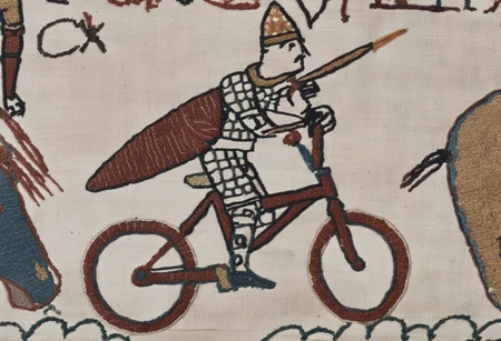 bayeux, knight in chain mail and helmet on a bicycle, holding spear over head <lora:bayeux:1>