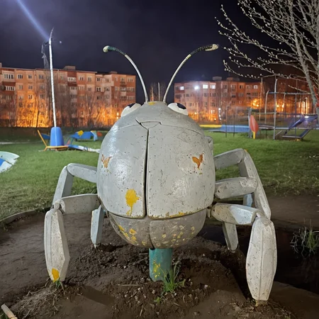 old concrete sculpture of a eerie bug on kids playground in russian suburbs, flaked paint, night shot, stark lighting, near pond <lora:dark slav suburbs_v0.0.1-15:0.8>