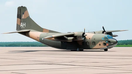 technical photograph of USAF (AIR_C123:2) sitting on an air force base runway, extremely detailed, infinite depth of field, f1.4, <lora:AC_C123:1>