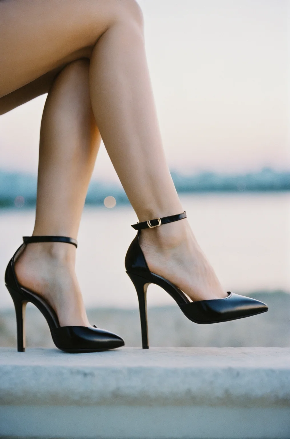 crescent moon,ankle strap heels,â³,the composition captured with a shallow depth of field that emphasizes the crisp detail of the subject against the bokeh of the serene backdrop film grain texture,uncensored,surreal,analog photography aesthetic,