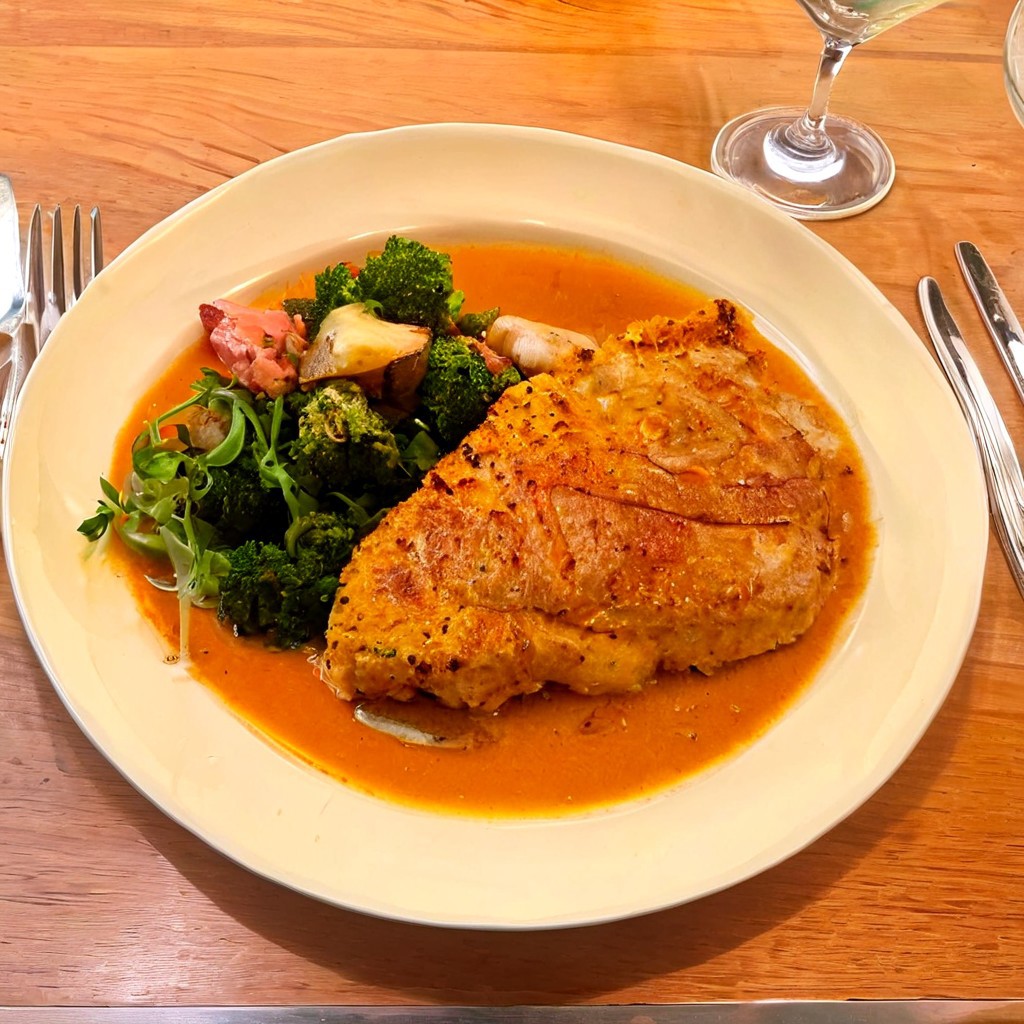 plate of food in a resturant, raw, photo, realistic