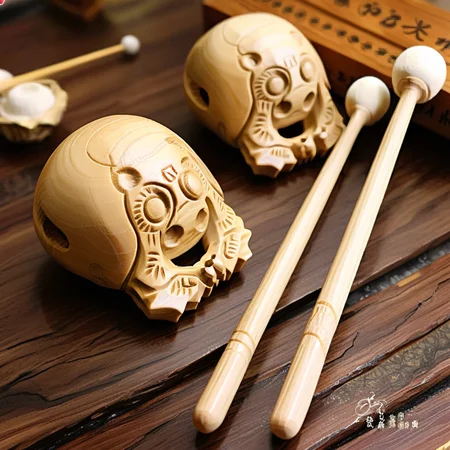 a mook use a panda color wooden skull musical instrumentt ,<lora:wood_fish:0.9>