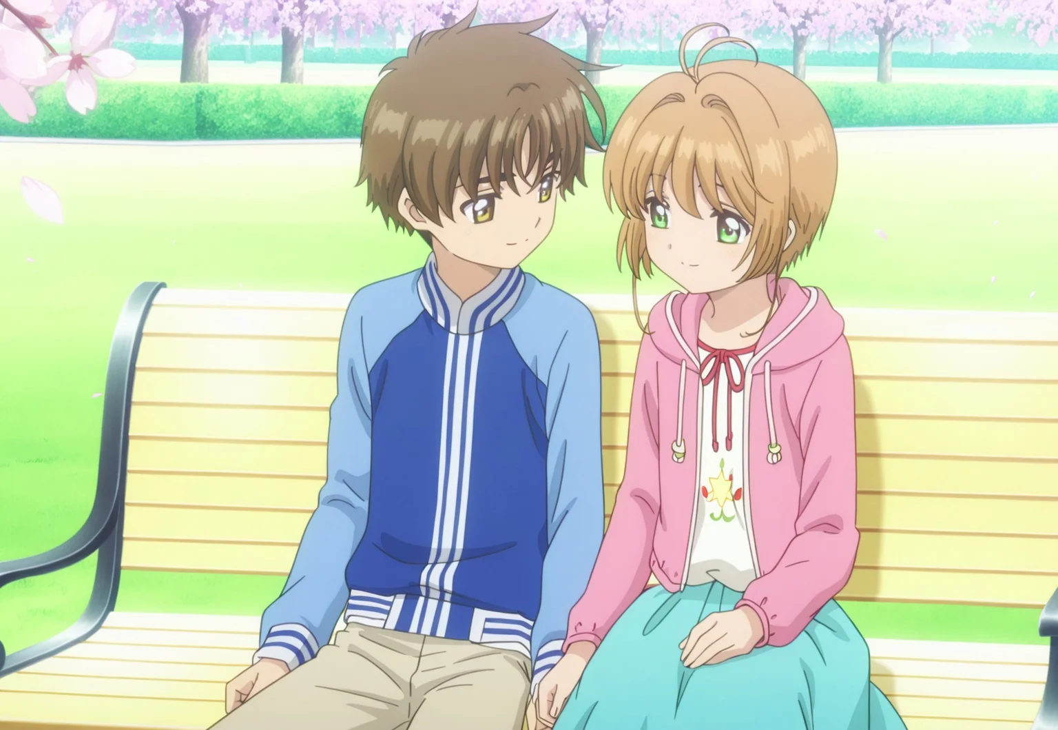 masterpiece, absurdres, highres, (anime screencap:2, anime coloring:2), official art, accurate art style, very aesthetic, flat colors, official screencap, style parody, proper proportions, CCS_Character-Pack, CCS_Clear Card, BREAK, 1girl, sakura kinomoto, brown hair, short hair, bangs, antenna hair, hair intakes, green eyes, sitting, pink sweatshirt, blue skirt, warm smile. other with male, BREAK, 1boy, syaoran li, brown hair, short hair, bangs, thick eyebrows, yellowish brown eyes, blue sweatshirt, brown pants, warm smile, BREAK, hetero, couple, BREAK, watching, cherry blossoms falling, BREAK, detailed background, outdoors, park, trees, mid-afternoon, BREAK, cowboy shot, BREAK, vibrant colors, bloom, vignette, cinematic lighting, 75% soft lighting, 25% dark lighting