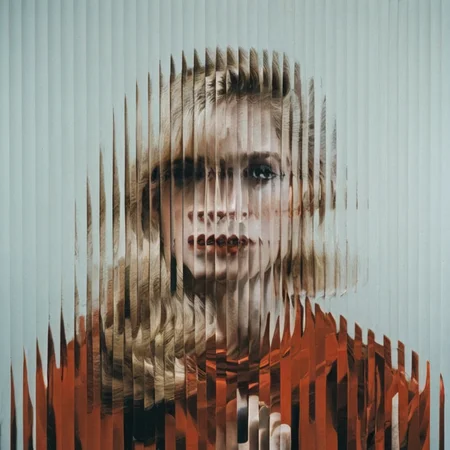 <lora:SDXL_Textured_glass_Test_Sa_May:1> a blond woman , red dress, curved glass, textured glass, fluted glass