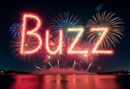 A spectacular nighttime sky filled with vibrant fireworks bursting in a choreographed display. The colorful explosions form the word 'Buzz' in the air, with each letter illuminated in a mix of bright hues—red, blue, green, and gold. The surrounding sky is dark and clear, dotted with a few faint stars. The perspective captures the grandeur of the scene, with the fireworks reflecting off a calm body of water below. The setting feels celebratory and magical, with the word 'Buzz' standing out prominently in the sky, glowing with radiant energy.