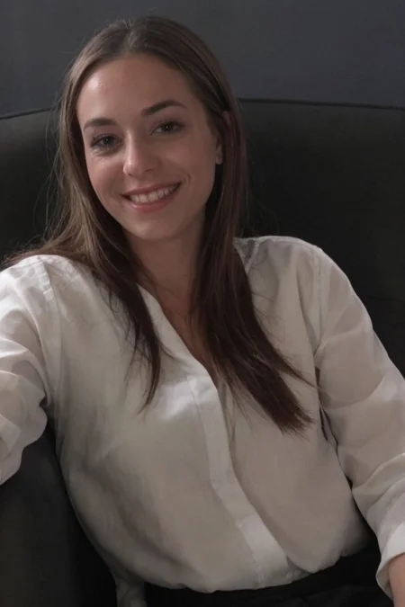 30yo American woman wearing bussiness suit holding a cigarrete
Dark black smooth long hair ponytail. smiling.
Looking at camera.
Dynamic varying pose.
Outside bussiness. Night time,
Night time, dark.