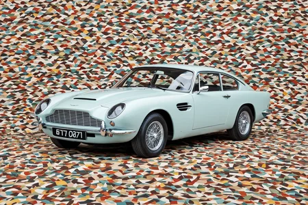 Papercut collage of <lora:AB ILL Vehicle:0.89>,Andrew Bell,classic car,aston martin,<lora:CHV-Zoom-000005:0.6>,Cornelisz Hendriksz Vroom,cinematic, . Mixed media, textured paper, overlapping, asymmetrical, abstract, vibrant<lora:stvmccrr:1><lora:stvmccrr:1><lora:stvmccrr:1><lora:stvmccrr:1>