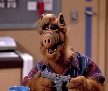 <lora:Alf Person - 1500:1> alf person holding a machine gun at the shooting range. photorealisitc, angry alf.
