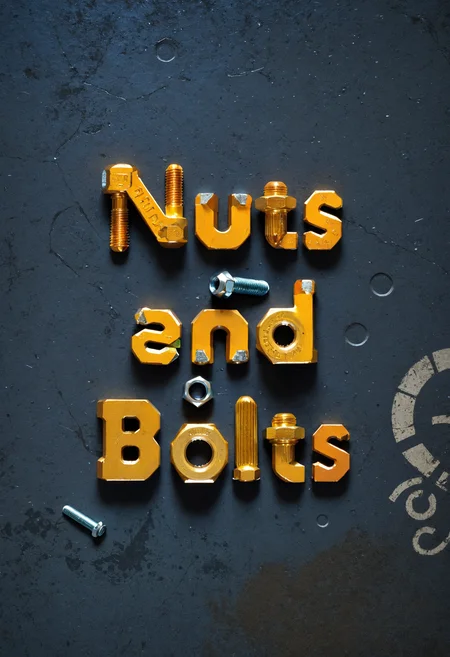 text "Nuts and Bolts" nuts and bolts style, on garage floor, concrete, full color, inspired, rich deep vivid colors, intricate, elegant, highly detailed, sharp focus, fine detail, striking beautiful, cinematic, great composition, innocent, scenic, attractive, artistic, thought driven, epic, stunning, creative,, cool, awesome, inspiring, amazing