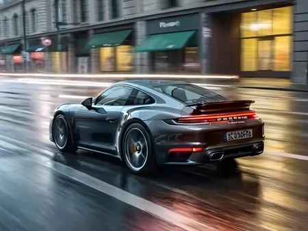 pch922ts car on a busy street at night, rainy, motion blur, fast, professional photography, flares, bokeh, <lora:pch922ts_car_SDXL:0.7>