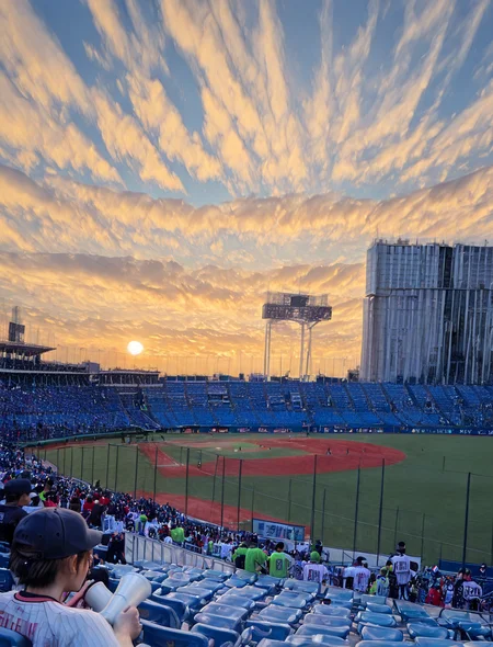 (1girl:1.5), (general:1.3), (detailed background:1.5), baseball jersey, (white jersey, red pinstripe pattern:1.1), dark blue baseball cap, dark blue undershirt, holding megaphone, happy, evening, BREAK
<lora:jingu_stadium:1> jingu stadium, outfield seats, stands, baseballfield, scenery, outdoors, audience, crowd, people, multiple boys, multiple girls, day, sunset, night, cloud, cloudy sky, sky, building, city, cityscape, skyscraper, sign, sun, blue sky, seats, BREAK
dramatic shadows, cinematic lighting, (photo background:1.1), (8K resolution:1.2), (masterpiece:1.2), best quality, amazing quality, very aesthetic, absurdres, newest, (ultra detailed:1.3), (uhd:1.1), <lora:cfg_scale_boost:0.7> <lora:Smooth_Booster_v2:0.5> <lora:StS-Illustrious-Detail-Slider-v1.0:3.0> BREAK