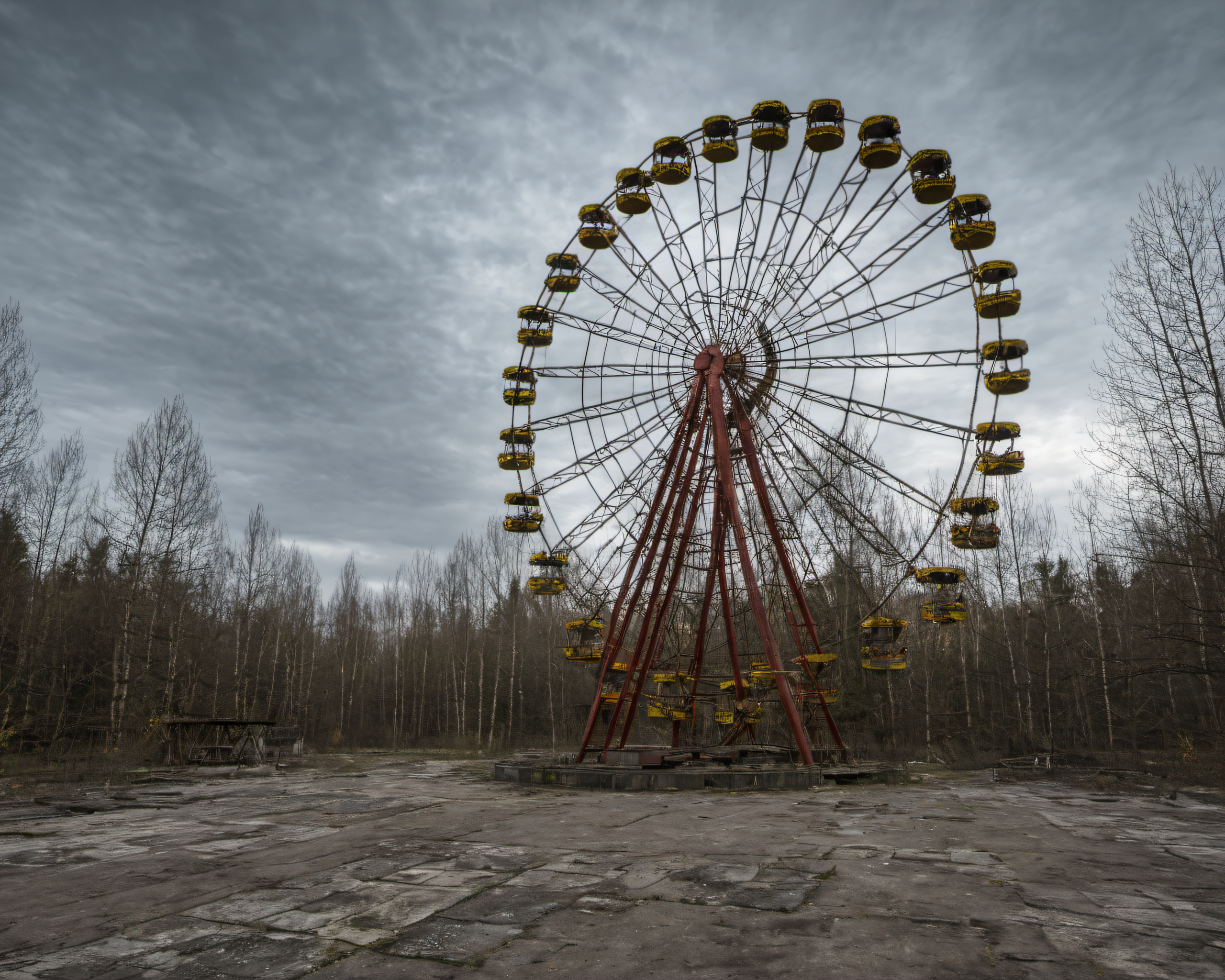 best quality, realistic, vray, hdr, a ferris wheel in an abandoned amusement park, Chern4byl enviroment  <lora:PostApocalyptic_Chernobyl_v3:0.8>
