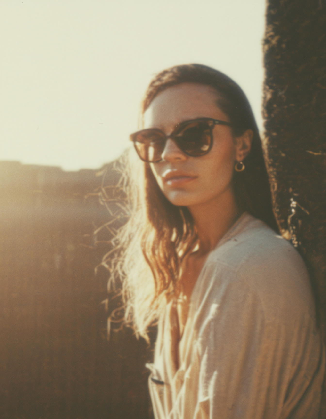 polaroid film photography, faded film, soft focus, beautiful woman with sunglasses, film grain, 4k, uhd, masterpiece