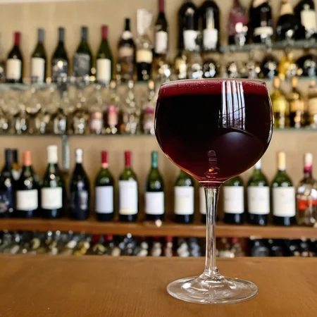 image of a glass of wine full to the brim. <lora:wineandclock:1>