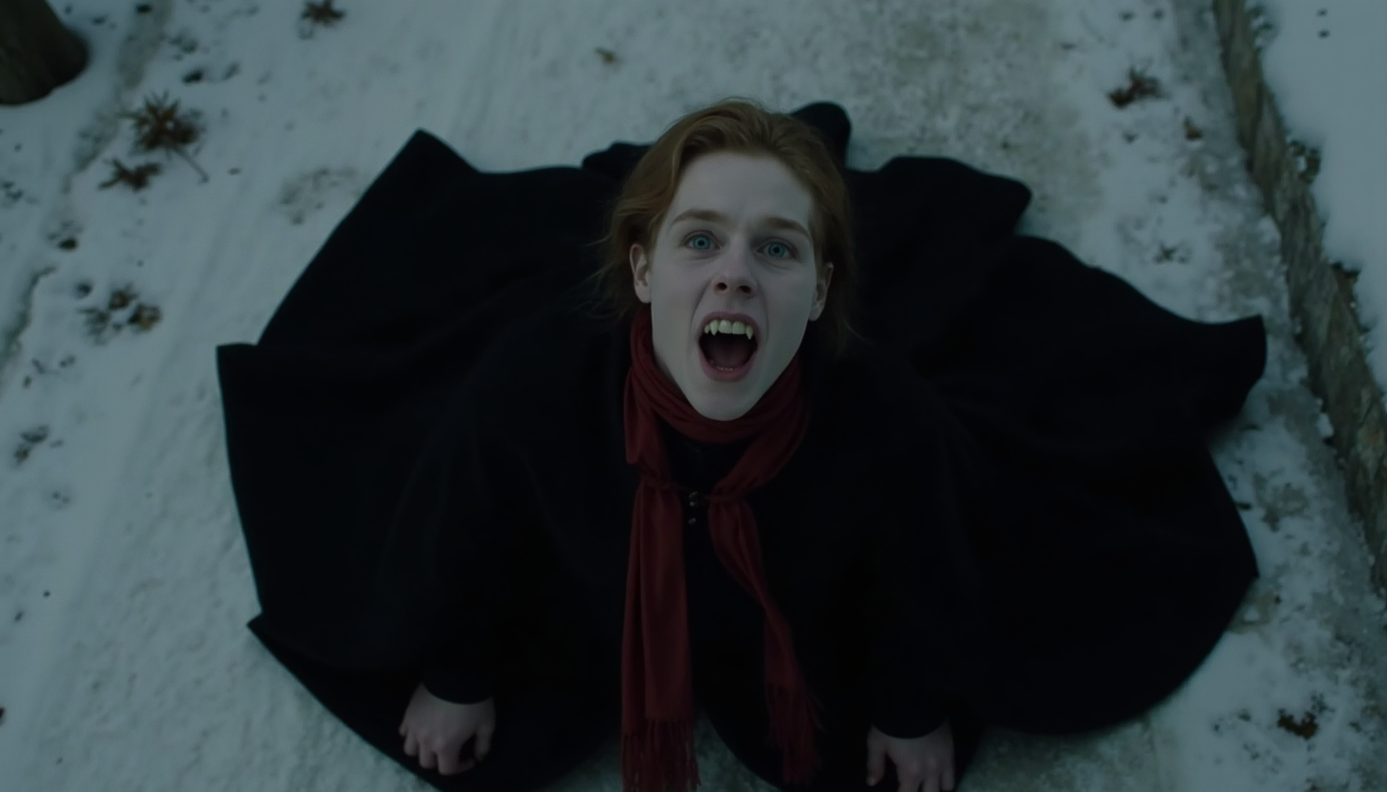 cinematic close-up shot of an aristocratic, deathly pale young vampire man screaming showing fangs, looking upward, taken straight from a above, in 1800s. Kneeling on snow, wearing a victorian long black cloak spread around him on the ground, red scarf. Very pale skin, auburn hair. At night in soft moon light, shadows of trees on the ground. Analogue film, IMAX, photorealistic, very detailed <lora:iwtv_flux_1_0:1>