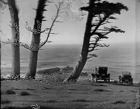 <lora:fdec:0.8>fdec car parked on edge of cliff by ocean with trees
photograph from 1920s