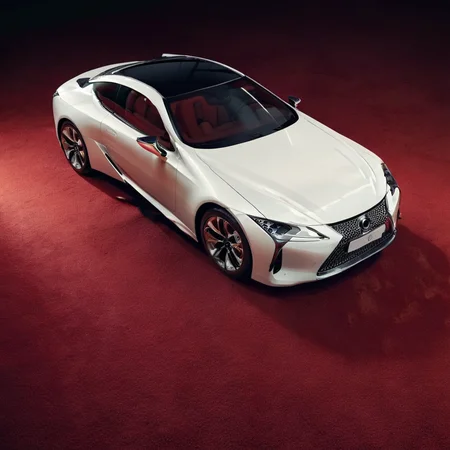 realistic photo of a white lexuslc car on a red carpet, spotlight, cinematic, <lora:LexusLC_SDXL_v1:1>
