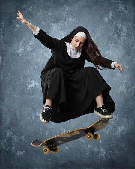 This is a highly detailed photograph capturing a dynamic moment of a woman performing a skateboard trick. The woman, dressed in a traditional nun's habit, is mid-air with her body angled forward and arms outstretched for balance. Her head is covered with a white veil, and she wears a black habit with a white collar. The habit is loose and flowing, creating a sense of motion and freedom. She has long, dark hair that flows behind her.
The skateboard, with its black deck and yellow wheels, is positioned beneath her feet, which are clad in black sneakers with white soles and yellow accents. The background is a textured, muted blue with subtle brush strokes, adding depth and a slightly abstract feel to the image. The lighting is soft and even, highlighting the textures of her clothing and the smoothness of the skateboard.
The overall style of the photograph is modern and high-resolution, capturing the essence of the moment with precision and clarity. , aidmaimageupgrader, aidmaMJ6.1