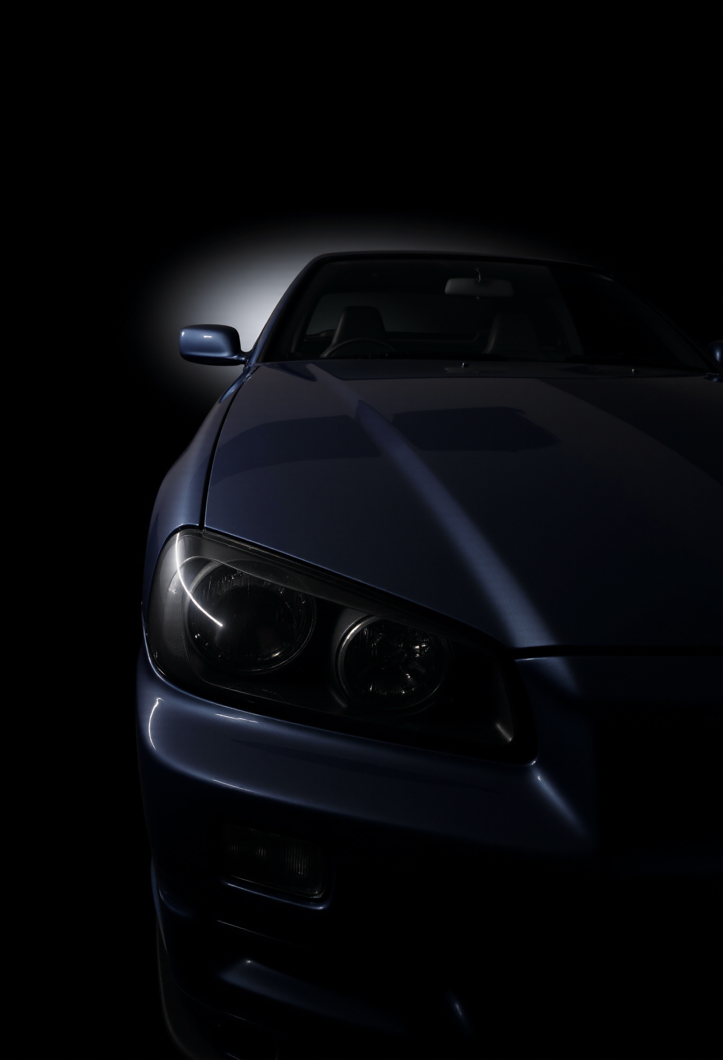 <lora:Nissan_Skyline_GT-R_R34:0.8> Nissan Skyline GT-R R34.
Dynamic side-skimming shot capturing the Skyline R34's hood line and side mirror, cold halogen spotlight skimming along the edge with surgical precision; rivulets of highlight reveal subtle indentations in the steel, the rest of the body vanishing into absolute black, creating the illusion of a phantom machine emerging from a black canvas of reverence.