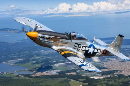 (masterpiece, best quality:1.2), ultra-detailed, flying through a blue sky P-51Mustang, (realistic:1.5), <lora:EdobP51Mustang_v1.0:0.8>