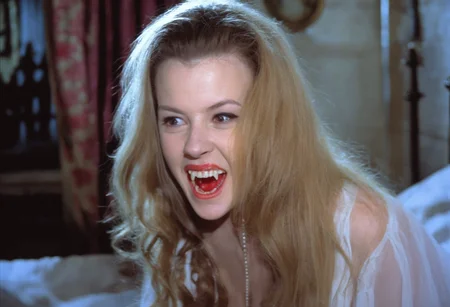cinematic (close-up:1.2) face of beautiful young vampire woman on a bed wearing white nightgown, pale skin, (m4rk5 on neck:1.3) blood on neck and chest, screaming showing teeth and (teeth and fangs:1.3), dark victorian bedroom at night, soft natural light, creepy atmosphere <lora:h4mm3r:1>