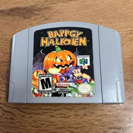 <lora:n64-000009:1> n64 videogame, cartridge, Spooky Halloween jackolantern