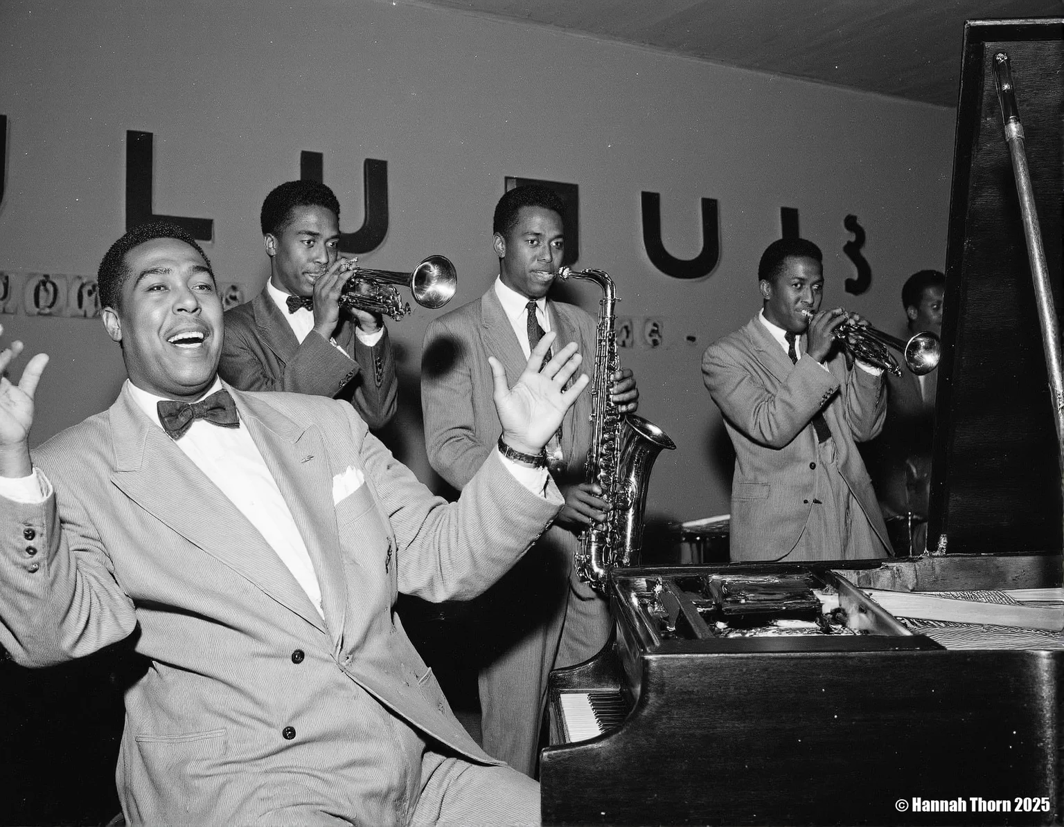 The picture is a black and white photograph of a jazz band performing on a stage. The image is sharply focused, capturing the energy and emotion of the musicians. The style is reminiscent of classic mid-20th century jazz photography, likely taken sometime between the 1940s and 1960s. The band is composed of at least five musicians: * A pianist is prominently featured in the foreground, seated at a grand piano, his mouth open in joyous expression, his hands raised as if in the midst of a lively performance. He's wearing a formal jacket with a bow tie. * To the left, a trumpeter stands, playing his instrument with concentration. * To the right of the pianist, a saxophonist plays a tenor saxophone. He's dressed in a suit and bow tie, maintaining a focused expression. * Slightly behind and to the right of the saxophonist, a trombonist is playing. * At the far right, a double bassist is seen playing his instrument, contributing to the rich texture of the music. Above the band, a sign reading "CLUB OASIS" is visible, indicating the venue where the photograph was taken. The background is dimly lit, drawing focus to the musicians. The lighting is characteristic of performance photography of that era, creating subtle shadows and highlights that enhance the mood and texture of the scene. The overall style is candid yet formal, capturing both the excitement of a live performance and the refined elegance of the musicians' attire. The monochrome palette adds a timeless quality, contributing to the image's nostalgic feel. The slightly grainy texture is also consistent with the photographic techniques of the time. <lora:_Flux\Vintage_Jazz-Club.safetensors:1.0:1.0>
