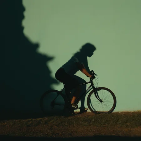 cinematic film still of <lora:silhouette style:1>
A silhouette photo of a shadow of a person on a bike on a wall,1girl,solo,grass,ground vehicle,scenery,sunset,sun,silhouette,dark,bicycle different shadow patterns, different shadows, cinematic, filmic, different colors, creative cinematography, covered in shadow, perfect shadow, detailed shadow, detailed background, detailed environment, award winning cinematography, casting shadow, film contrast, film saturation, high quality, 8k, silhouette style, shallow depth of field, vignette, highly detailed, high budget, bokeh, cinemascope, moody, epic, gorgeous, film grain, grainy