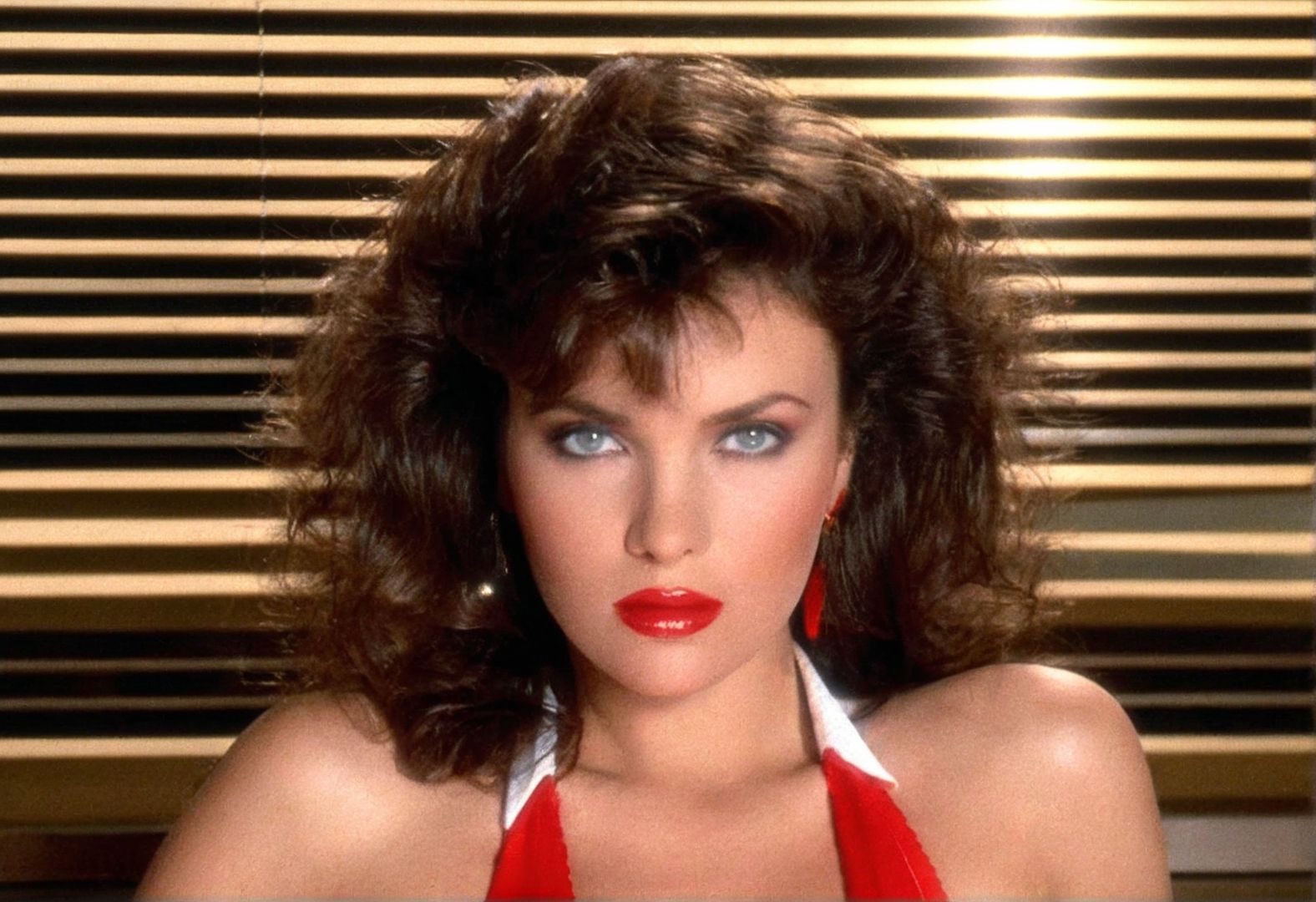 (((analog photo))) CinematicPortrait woman brunette (provocative slavic) cleavage indoors masterpiece, grey eyes, hair glow, (glossy dark lipstick), (blinds backlight), ((looking at viewer, soft focus, depth of field)), (((film grain))) <lora:CinematicPortraitXL_v3:0.6>  <lora:EuroBabe-v4-XL:0.6>