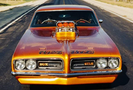 VintageMuscleCar gleaming dragster, sunny, road, landscape, 4K, highly detailed, closeup (stylish grainy analog film photo 35mm, "BUZZ")