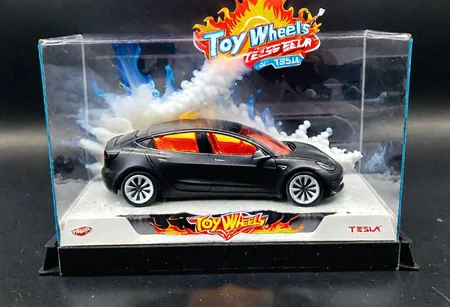 Hot Wheels toy car company have made a toy car version of a Tesla Model 3, The toy telsa model 3 car comes in a mini display unit/box. The car is exploding into fire and flames, white smoke fills the top of the display box, (realistic explosion from car), (realistic Flames bellow from the car windows inside the display unit),  Painstaking Attention To Details,