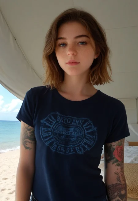 andrea, 1girl, solo, rating_safe, beach, upper body, t shirt, jeans, arm tattoo, freckles