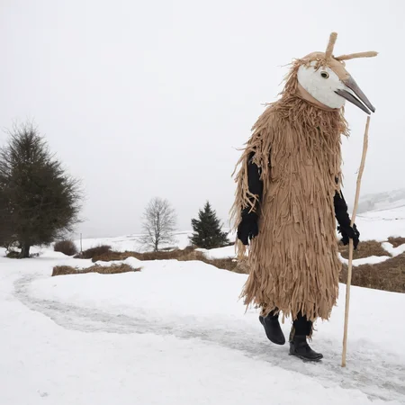 <lora:SDXL_Mask_Sa_May:1> mask, a person dressed in a costume walking in the snow
