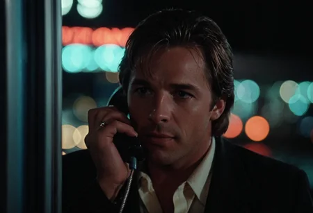 cinematic film still Sonny Crockett, MiamiVice, closeup, night, city lights, bokeh, phone booth, telephone . shallow depth of field, vignette, highly detailed, high budget, bokeh, cinemascope, moody, epic, gorgeous, film grain, grainy
