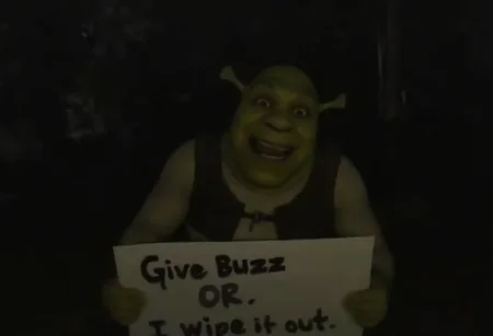 An omegle.com webcam taken at night of Shrek in a swamp smiling a very wide, creepy, and extremely uncanny smile. It is dark. Holding a sign that says "Give Buzz or I wipe it out" <lora:lora09.TA_trained:1>