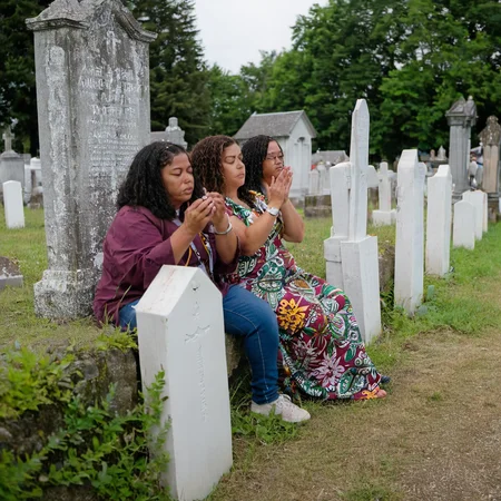 photo of two woman with their eyes closed at a graveyard<lora:boring-v4-faces-version:1>
