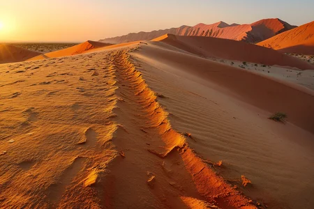 Atop the sand dunes of Sossusvlei in Namibia, where orange crests ripple endlessly and shadows stretch across cracked earth. At night with faint sandstorm, (dust glow:1.2) floats in moonlight, outlines waver, and wind whispers.,