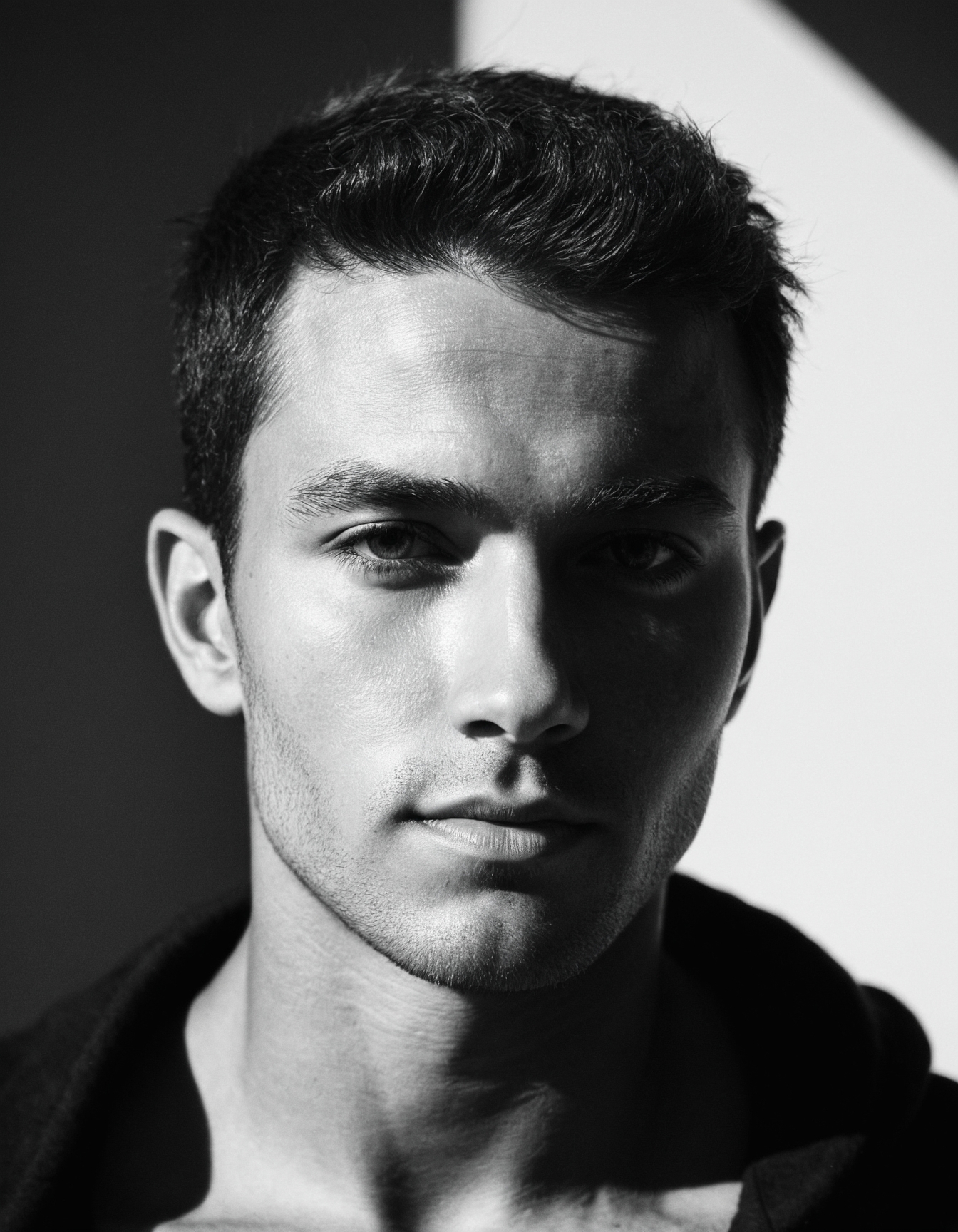 b&w, instagram photo, portrait photo of man, 28 y.o, perfect face, natural skin, hard shadows, film grain