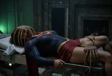 <lora:Xenomorph_Facehugger_Attack_-_Alien_Flux_v2:0.7>(Xenomorph Facehugger),A highly detailed cinematic live-action scene of a female superhero resembling Supergirl, unconscious on a damaged sci-fi medical bed inside a dark, abandoned spaceship lab. She is wearing a textured deep blue superhero suit with a large red and gold "S" emblem on her chest, a red cape draped around her arms, and a golden belt. One realistic alien facehugger creature is attached tightly to her face, its long bony legs wrapped around her head and neck, dripping slimy fluid. A second facehugger is positioned ominously between her thighs, partially obscured by her red skirt, its limbs gripping her upper legs, creating a tense, invasive horror atmosphere. The room is lit with moody green and blue lighting, showing worn metal walls, broken cables, and industrial machinery. Wet surfaces, soft cinematic depth of field, shadows, photorealistic textures on skin, fabric, and alien creatures. Horror sci-fi aesthetic, inspired by Ridley Scottâs *Alien* and the dark realism of Zack Snyder's superhero films.
<lora:EXM:0.36> ,<lora:Flux Muscle v2 fp8:0.33>, <lora:Facehugger:0.5>, <lora:supergirl_dev_f1:0.3>, <lora:MysticXXX-V6:0.6>