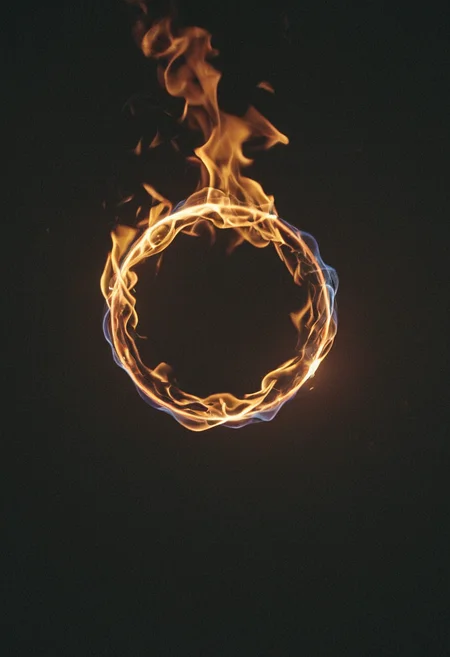 cinematic film still <lora:R0k00bstr0ctHD:1>,r0k00bstr0cthd,r0k00bl0ckb0ckgr00ndhd,(shiny, fire, multicolored, black background, glowing, magic circle, aura), . shallow depth of field, vignette, highly detailed, high budget, bokeh, cinemascope, moody, epic, gorgeous, film grain, grainy